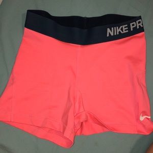 Peach Nike spandex shorts